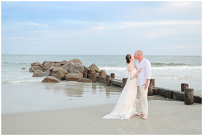 Folly Beach Wedding Photography of Bride and Groom at Sunset by April Meachum Photography in Charleston