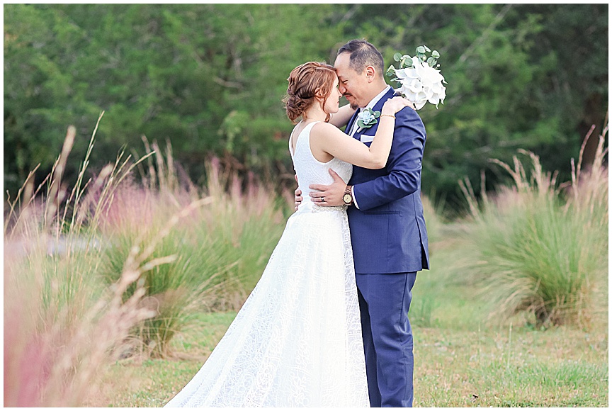 Beautiful Founders Hall Wedding in Charleston SC. Photos of Bride and Groom at sunset by April Meachum.