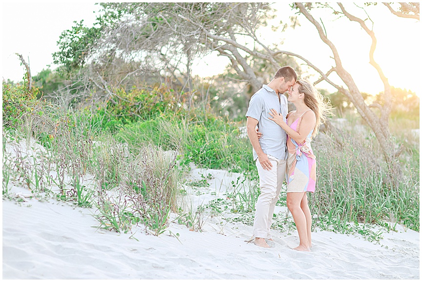 Charleston Wedding Photographer April Meachum captures a Sunset Engagement photos at Folly Beach